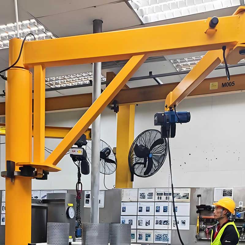 Knuckle jib covering an assembly station