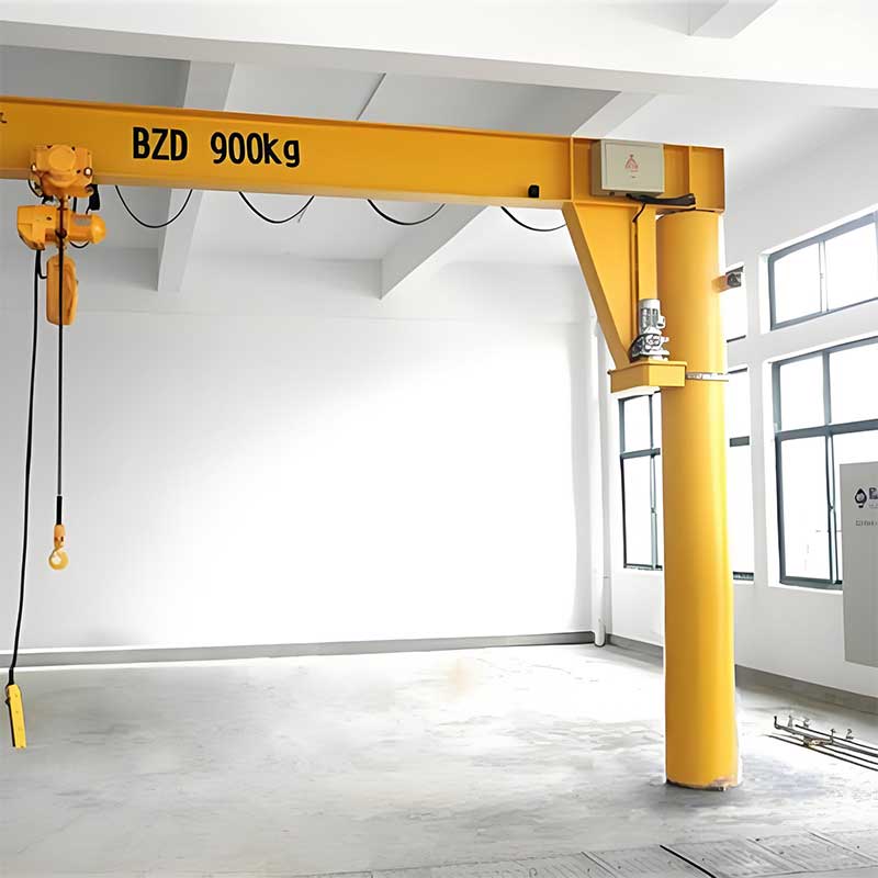 Jib crane with electric chain hoist covering an assembly cell