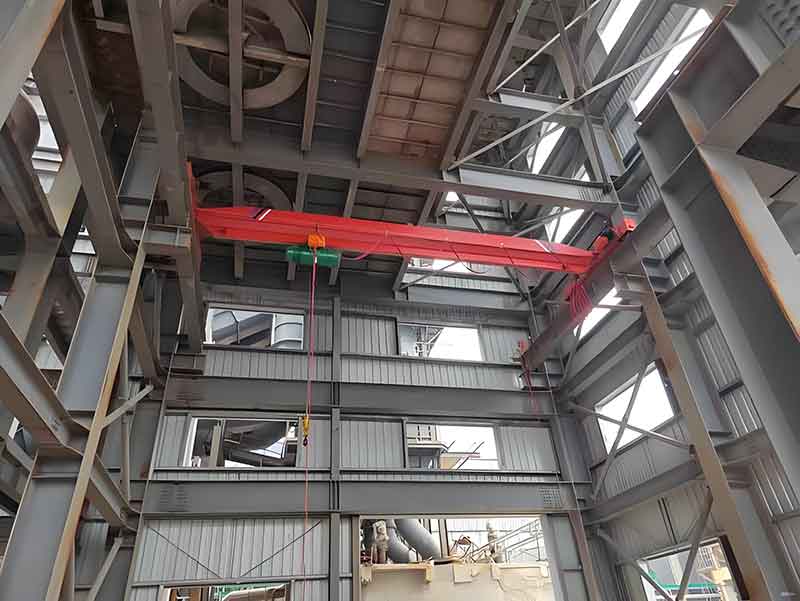 Underslung end carriage with wheel block